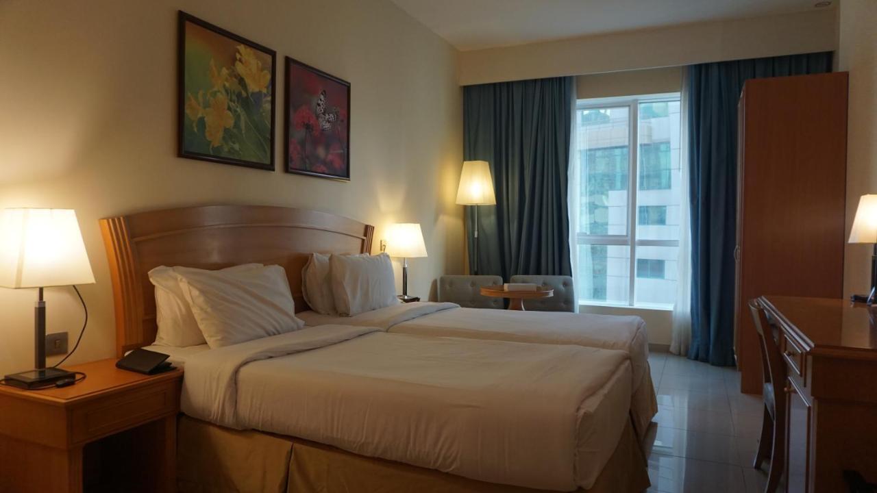 Golden Tulip Hotel Apartments Charjah Extérieur photo